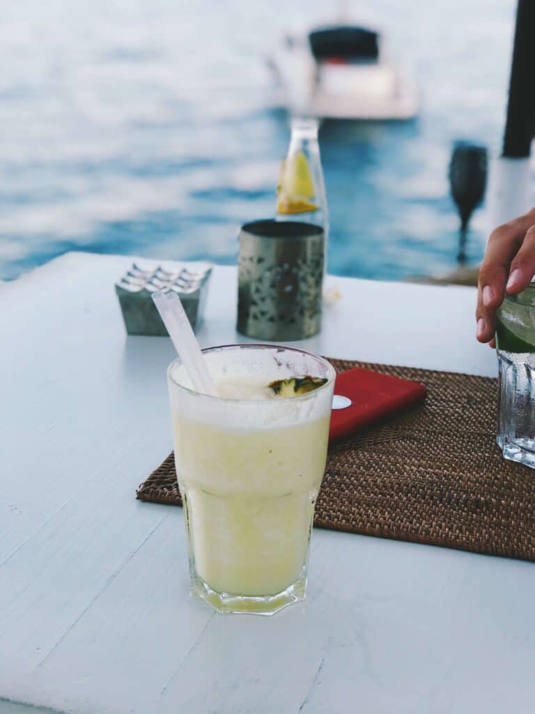 Mallorca Travel Itinerary in 4 Days 16 Irene having a drink at illetas beach in mallorca