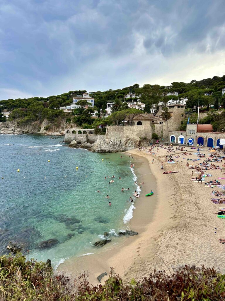 Scenic beach with people enjoying sun
