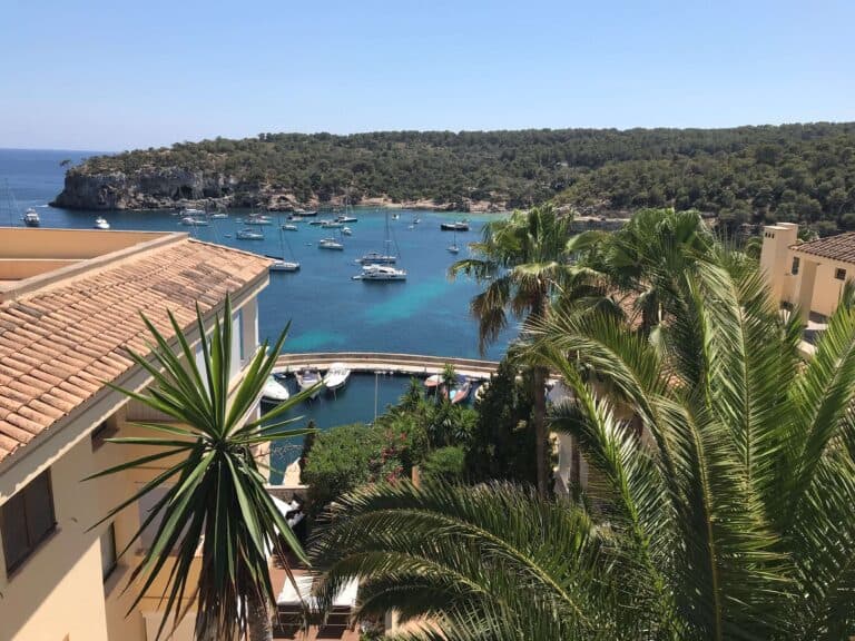 Scenic view of boats and greenery.