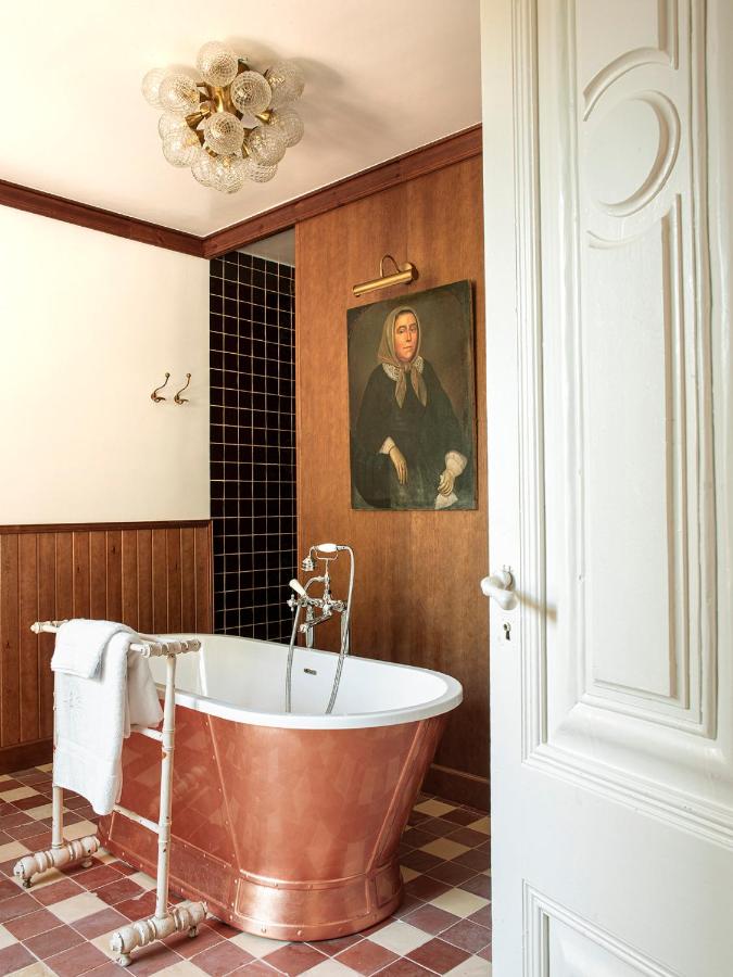 Complete 7 day Costa Brava Itinerary 8 Elegant copper bathtub in stylish bathroom.