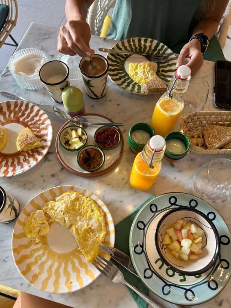 10 BEST Riads in Essaouira 54 Irene and friend enjoying breakfast at Le Palazzo hotel, one of my top riads in Essaouira