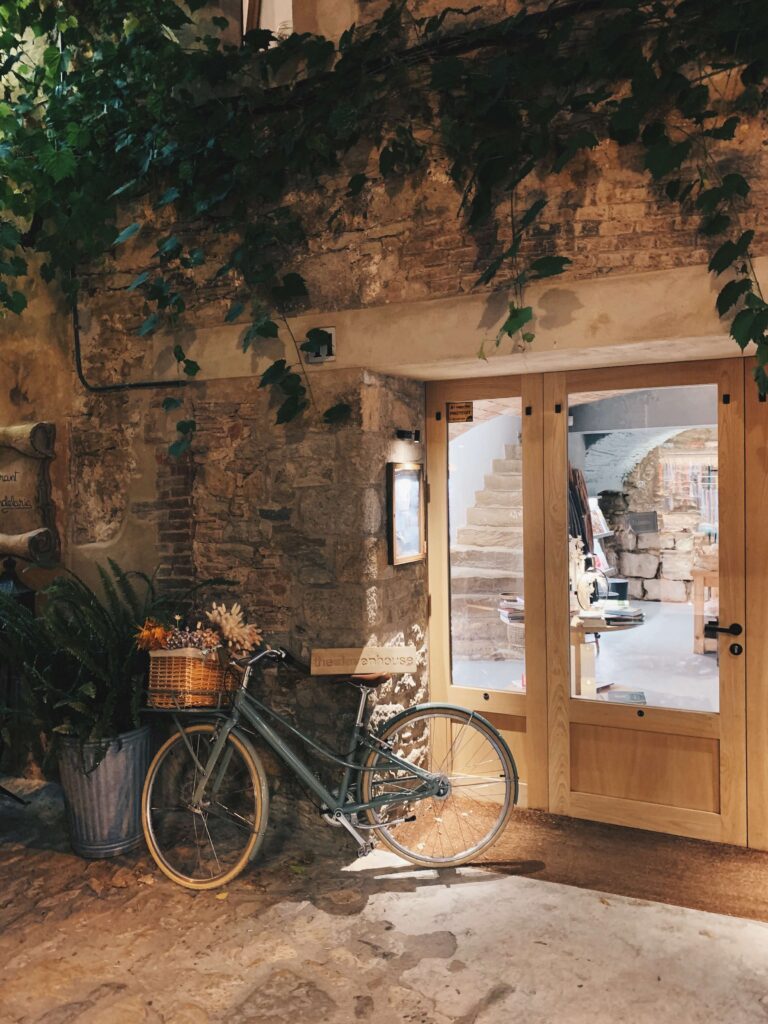 Complete 7 day Costa Brava Itinerary 16 Charming store entrance with bicycle.