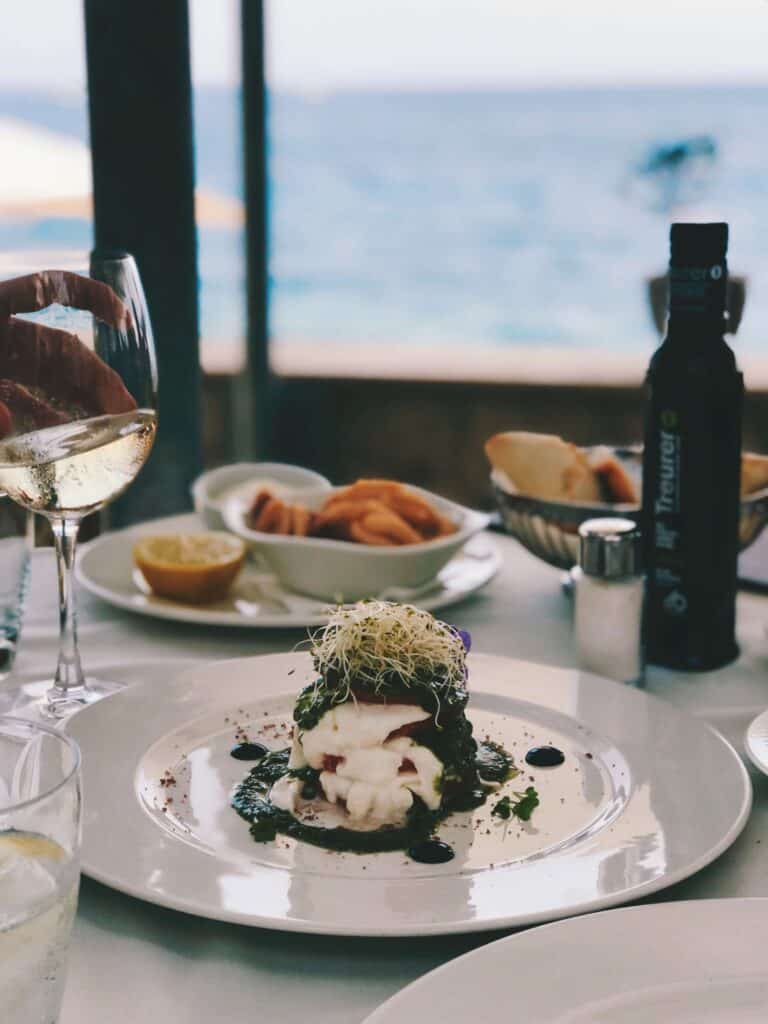 Mallorca Travel Itinerary in 4 Days 23 Elegant seafood dish with wine