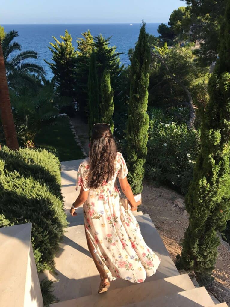 Mallorca Travel Itinerary in 4 Days 15 Woman walking towards ocean view