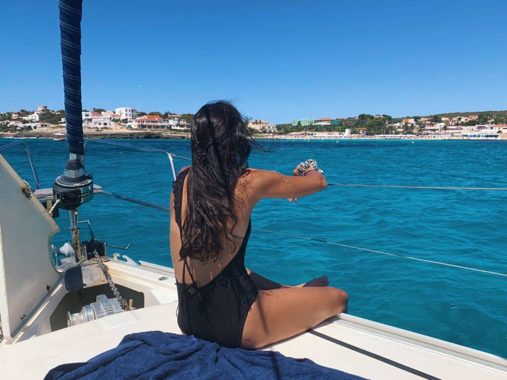 Exploring the Best Beaches in Menorca 7 Irene enjoying sailing in Menorca, Spain