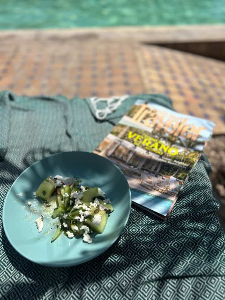 10 BEST Riads in Essaouira 9 Salad and magazine by the pool.