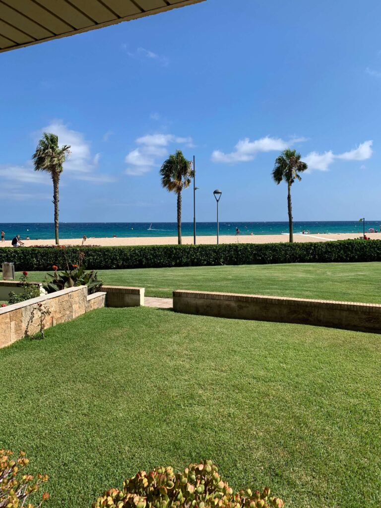 Complete 7 day Costa Brava Itinerary 19 Lush garden overlooking a beautiful beach.