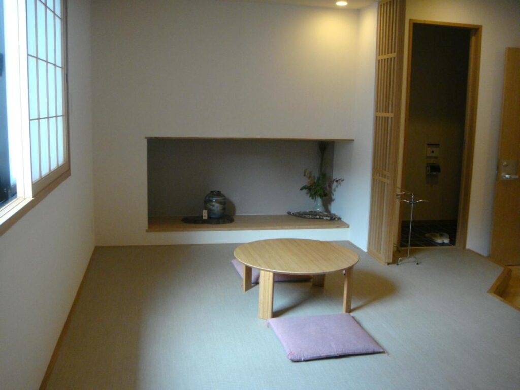 8 UNIQUE Miyajima Ryokans, Hiroshima 33 Minimalist Japanese ryokan seating area