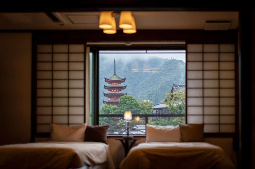 8 UNIQUE Miyajima Ryokans, Hiroshima 12 Serene room with view of pagoda.