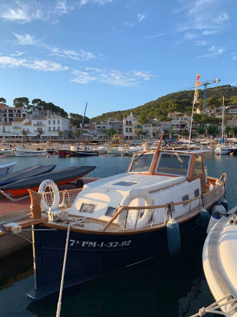 Complete 7 day Costa Brava Itinerary 10 Boat docked in picturesque harbor.