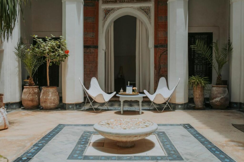 7 UNIQUE Riads in Fez You Won't Forget 2 central patio at riad dar el qadi, one of the best budget riads in marrakech, morocco