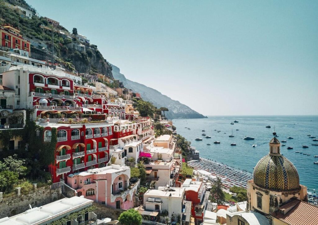 Boutique Hotels on the Amalfi Coast 1 Le Sirenuse's colorful red facade and terrace, one of my favorite boutique hotels on the Amalfi Coast