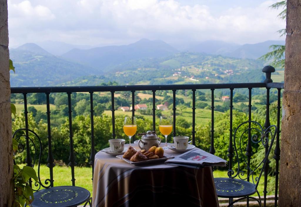 outdoor breakfast with incredible views at palacio de cutre, one of the most authentic boutique hotels in asturias