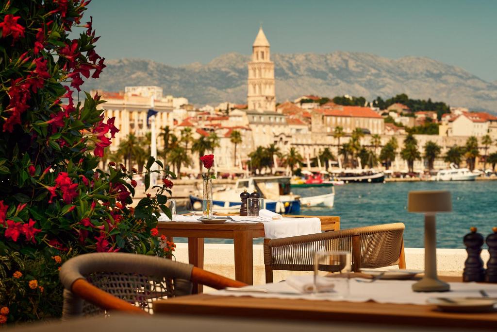 8 TOP Boutique Hotels in Split 23 outdoor dining area at hotel ambasador, one of the best hotels where to stay in split