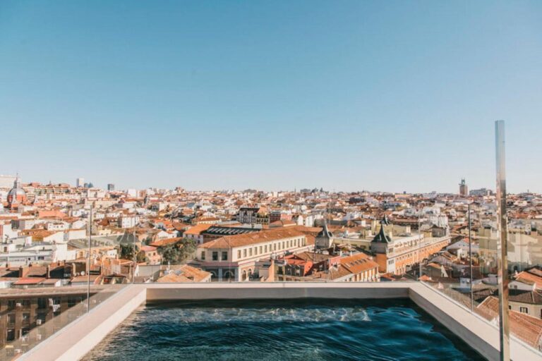 rooftop pool at dear hotel madrid, a beautiful hotel where to stay in madrid first time you visit