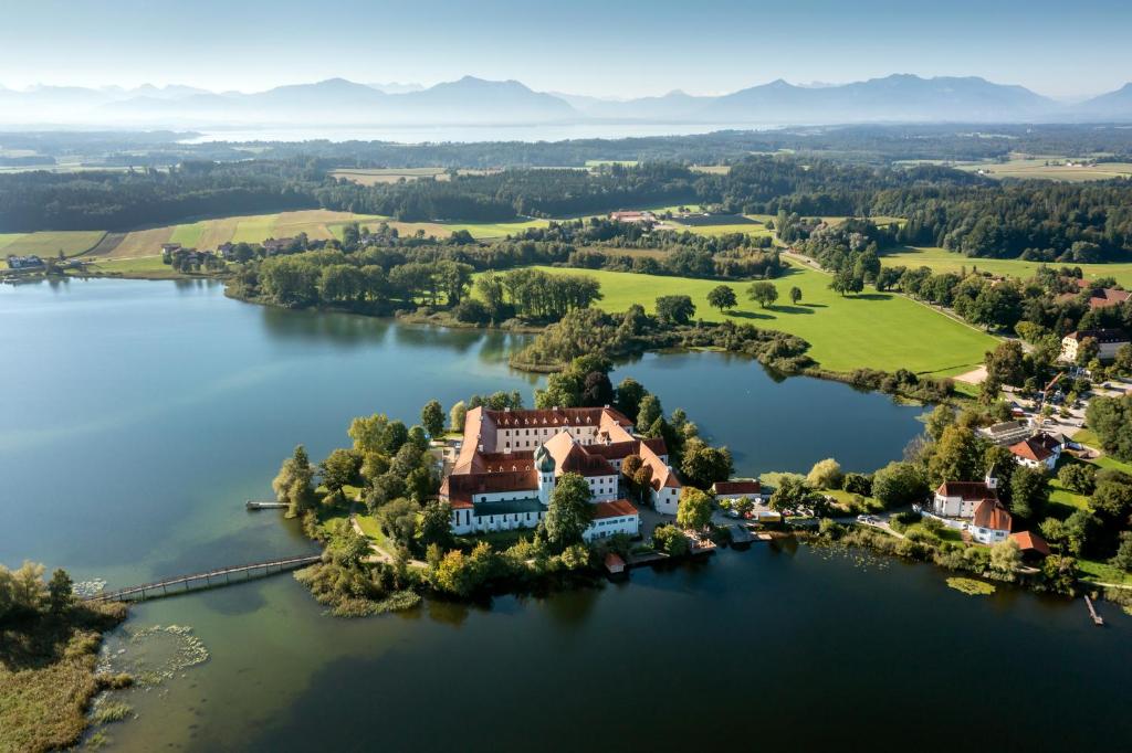 FAIRYTALE Castle Hotels in Bavaria 1 sky view of kloster seeon, one of the most beautiful and unique castle hotels in bavaria, germany