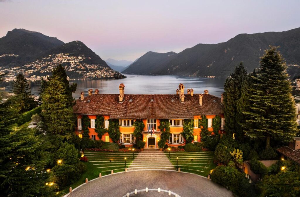 sky view of facade of villa principe leopoldo, one of the most luxurious and best hotels in lugano, switzerland