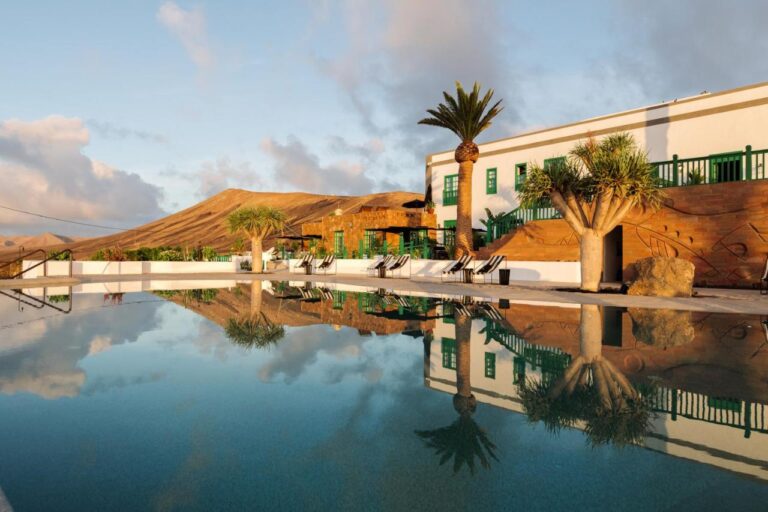 swimming pool and facade at sunset time at cesar lanzarote, one of my favorite adults only hotels in lanzarote spain