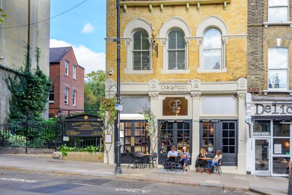 15 Best Boutique Hotels in London, UK 25 yellow traditional facade at oak and poppy boutique apartment, one of the cooles boutique hotels in london