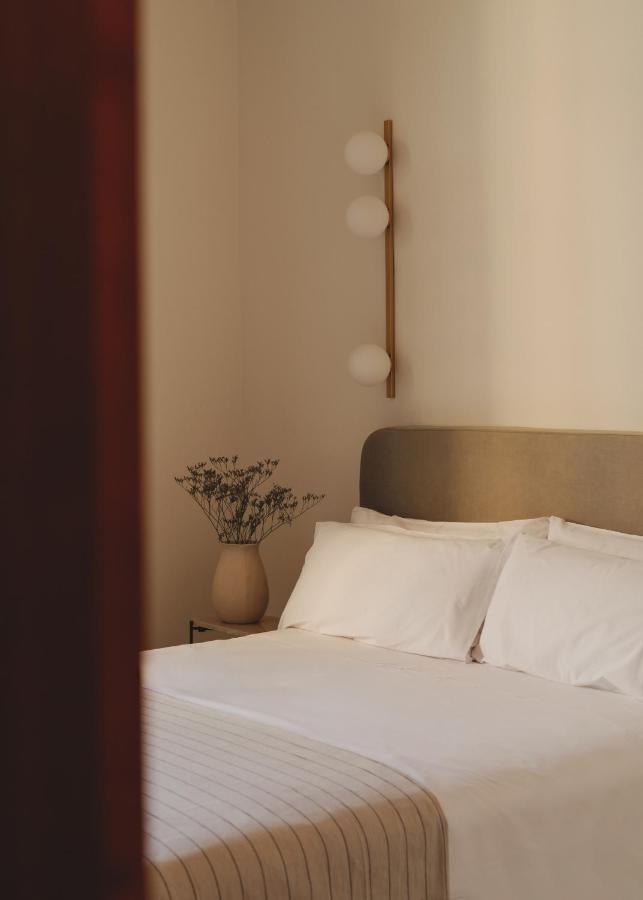 13 Unique Hotels in Barcelona, Spain 14 Cozy, modern bedroom with soft lighting.