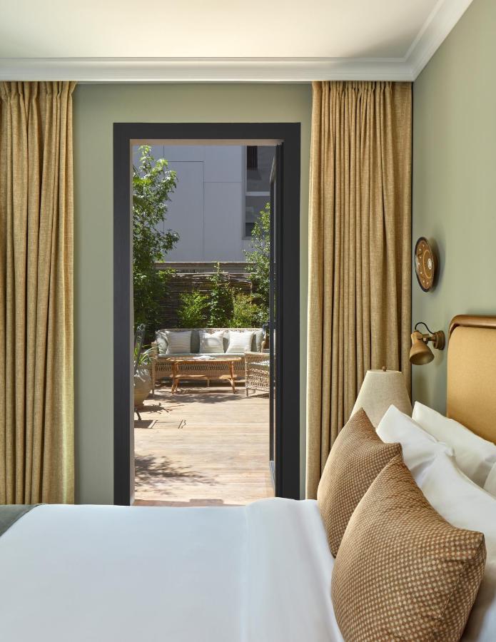 13 Unique Hotels in Barcelona, Spain 19 Cozy room with terrace view.