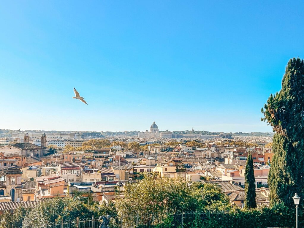 3 Days in Rome Itinerary 1 Irene walking around Villa Borghese park in Rome, with views of the city, as part of my 3 days in Rome Itinerary