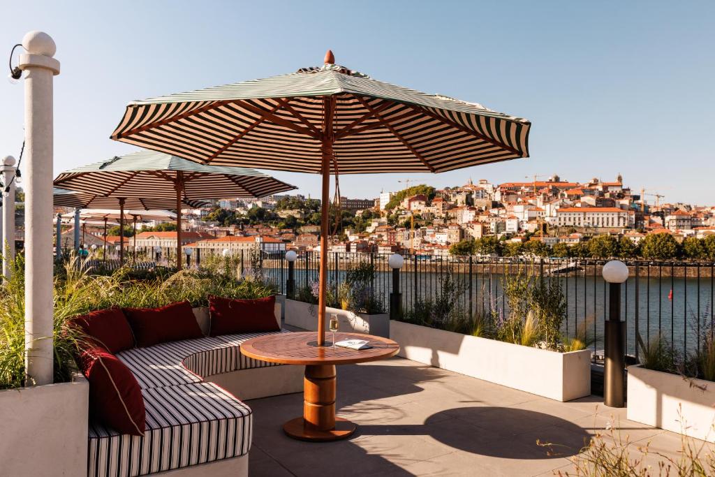Top 12 Boutique Hotels in Porto, Portugal 1 outdoor terrace with river views at the rebello small luxury hotel, one of the best boutique hotels in porto