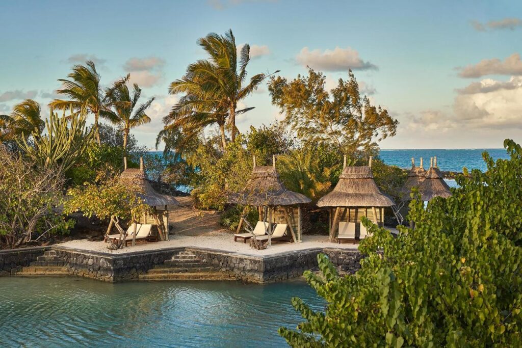 Most Unique Adults Only Hotels in Mauritius, Indian Ocean 3 sun loungers in little cottages to sun bathe at paradise cove boutique adults only hotel in mauritius