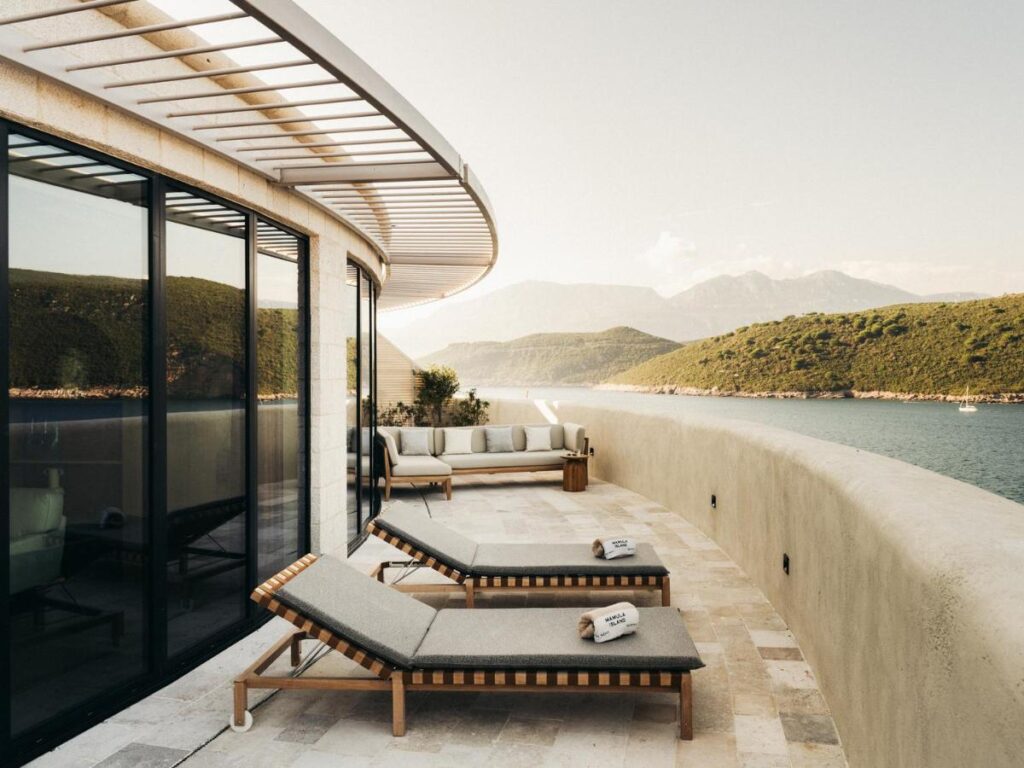 Most Authentic Boutique Hotels in Montenegro, Europe 1 sun loungers in terrace at mamula island hotel, one of the most beautiful and unique boutique hotels in montenegro