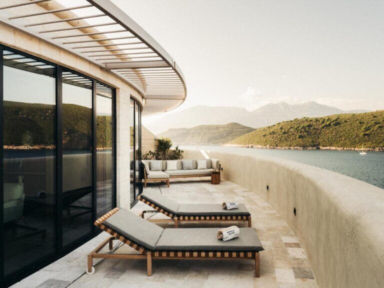 sun loungers in terrace at mamula island hotel, one of the most beautiful and unique boutique hotels in montenegro
